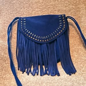 Blue Saddle style cross body purse.